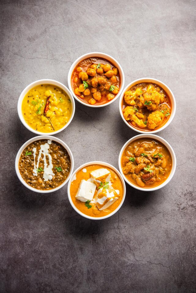 group-indian-vegetarian-dishes-hot-spicy-punjabi-cuisine-meal-assortment-bowls-large
